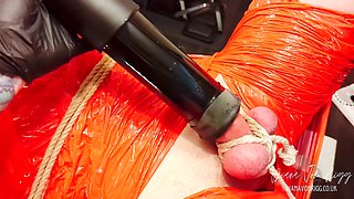 Merciless Cock Milking (tight Shiny Red Plastic Mummificaton and Remote Anal Stimulation)