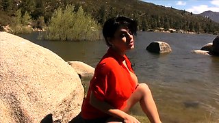 Attractive brunette teenager with big boobs fingering pussy