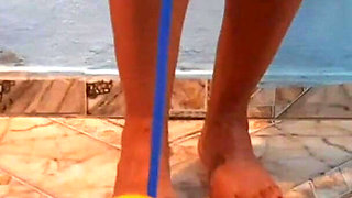 She Exhibited off Her Beautiful Body and Feet, Inflating the Condom by Stepping on the Foot Pump