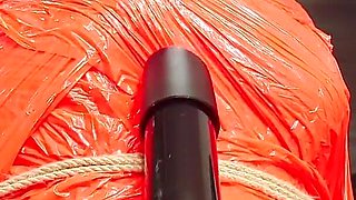 Merciless Cock Milking (tight Shiny Red Plastic Mummificaton and Remote Anal Stimulation)