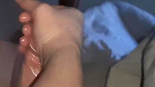 Handjob While Playing in Bed