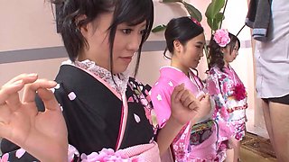 Several curvy Asian ladies in floral kimonos bring the heat for a gangbang