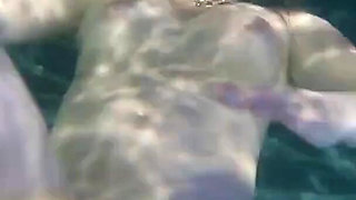 Sunny Lane sucks cock underwater