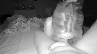 I secretly fuck my mother-in-law while everyone is in the living room. I stick my cock in her mouth.