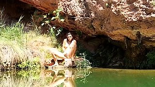 Wild girl posing naked and playing with herself outdoors