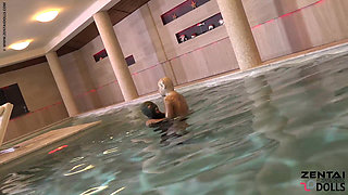 Two Zentai Girls with Slave in Pool