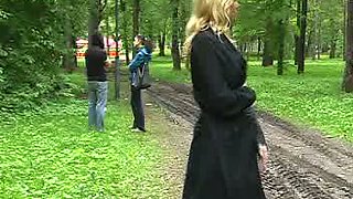 Busty and lean Russian blonde teen in the park showing her goodies