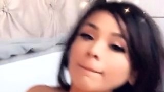 Busty curly brunette with big boobs fucks on couch