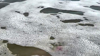 Waves Crashing on Size 16 Feet & Legs