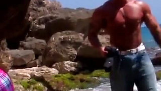 Adorable hottie rammed on the beach by a huge hunk