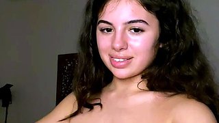 Busty curly brunette with big boobs fucks on couch