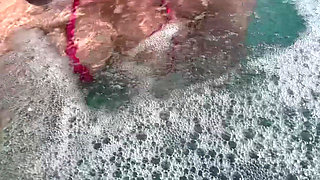 Artemisia Love Sexy and Horny Underwater Showing Her Big Tits in a Super Micro Bikini and You Can See Her Aureolas…