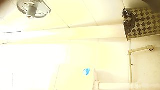 Cute amateur asian web cam girl playing with her toy