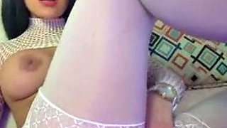 Busty curly brunette with big boobs fucks on couch