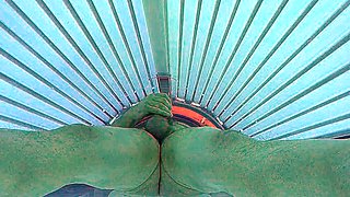 Masturbating in public tanning bed