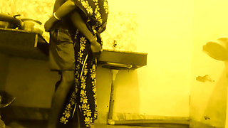 Busty MILF Desi Bhabi Has No Idea Her young Devar see Secretly in the kitchen room.