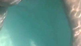 Artemisia Love Sexy and Horny Underwater Showing Her Big Tits in a Super Micro Bikini and You Can See Her Aureolas…