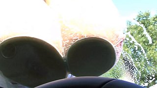 Blonde is flashing her big boobs in the outdoors