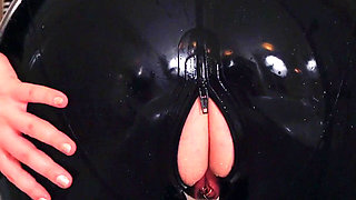Wet MILF washing in latex rubber catsuit, pussy ass tease