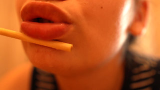 I'm Sucking and Licking a Popsicle, Playing with It Using My Lips and Mouth.