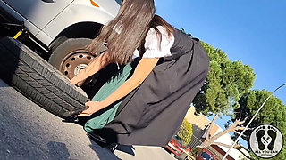 Dirndl Slut Gets Dirty and Oily Changing Tires