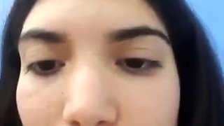 Horny teen rubs her pussy