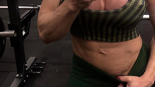 Blonde bodybuilder showing her massive muscles