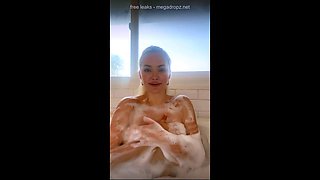 Lindsey Pelas Showering In A Bathtub