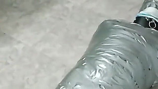 Latino Hunk Heavily Mummified by Cooperative Femdom Women