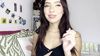 Julie Oliver gives a close-up tease of her perfect natural tits