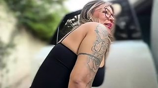 Blonde is flashing her big boobs in the outdoors