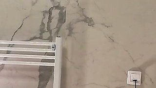 Amazingly Beautiful Hot Brunette Babe in the Bathroom Takes Her Thong off Under White Mini Tennis Skirt to Flash Shaved Pussy