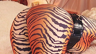 Submissive MILF gagged and bondage taped in spandex catsuit