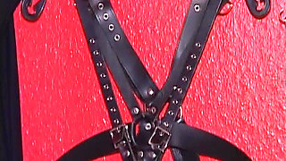 Mature Leather Domme Binds Her Fishnet Slave