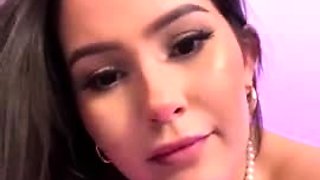 Brunette seductress working her big boobs and hot ass