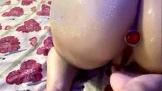 Latina is tied and plugged in ass