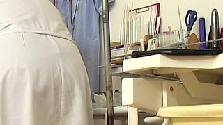 Busty mature woman in her gyno examination