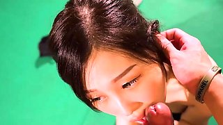 Asian woman in thong gives bf oral sex
