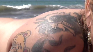 Tattooed MILF Nery Gets Pounded Hard on Beach Rocks