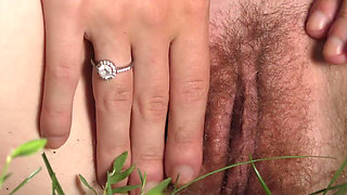 Amateur solo masturbation outdoors from a young brunette
