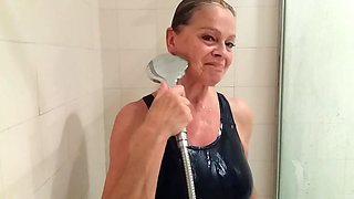 Grandma in a Tight Swimsuit Taking a Shower!