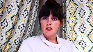 Pink labia close up of naive brunette playing with her name