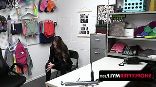 A woman with a large bust is apprehended for breaking regulations and is subsequently subjected to control by a security guard in a private area.