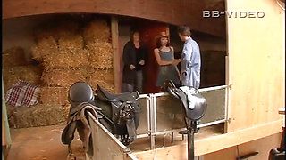 In the middle of the hay, the sexy German opens her eager pussy to be licked and penetrated with passion