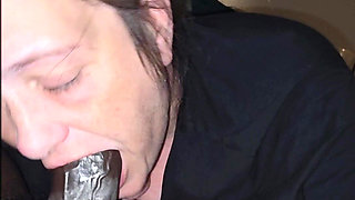 Mature Cocksucker Eats a Black Cock