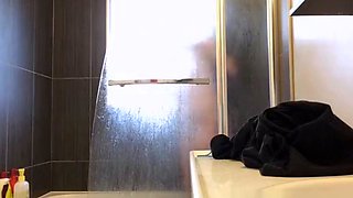 Peeking at my curvy tattoo stepmom showering