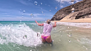 Girl Wetting Jeans in the Ocean and Swimming in Wet White T-shirt