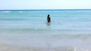 Nudist Beach Fun: Hot Girl Helps Guy Jerk Off in Public