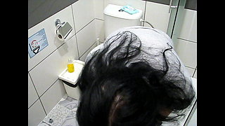 Hidden camera filmed mom while masturbating in the toilet