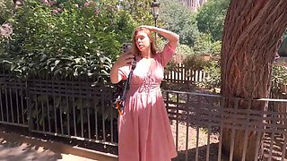 Sweet tourist teen wearing a nice pink dress gives the best head to a local guy outdoor